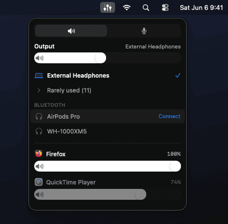 Fader popover under the menu bar: output devices, Bluetooth section, per-app volume faders